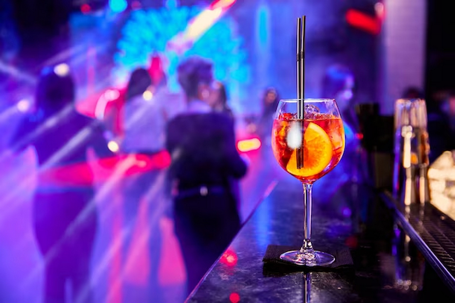 Image of a club with a focus on a drink